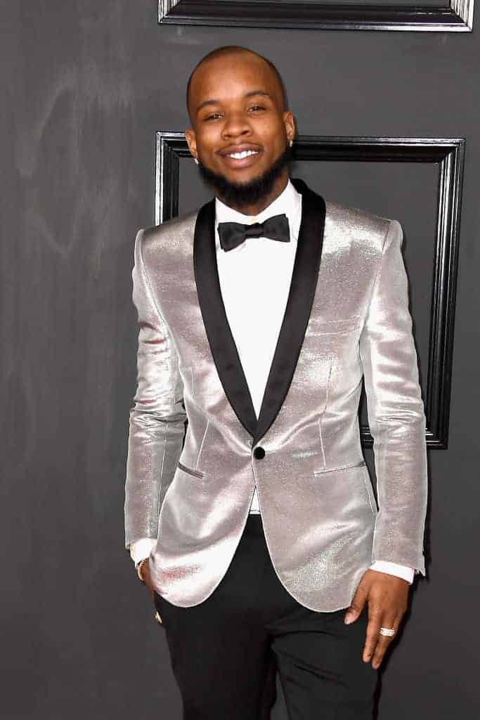 Tory Lanez in gray velvet tuxedo jacket