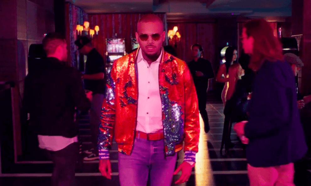 Still of Chris Brown in Sequined Jacket and multicolored lights from "Privacy" video