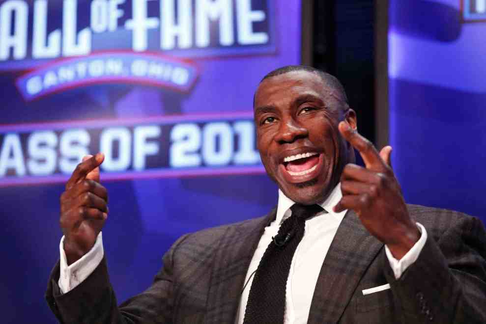 Shannon Sharpe looks on  Super Bowl XLV - Pro Football Hall of Fame Announces 2011 Class Enshrinees