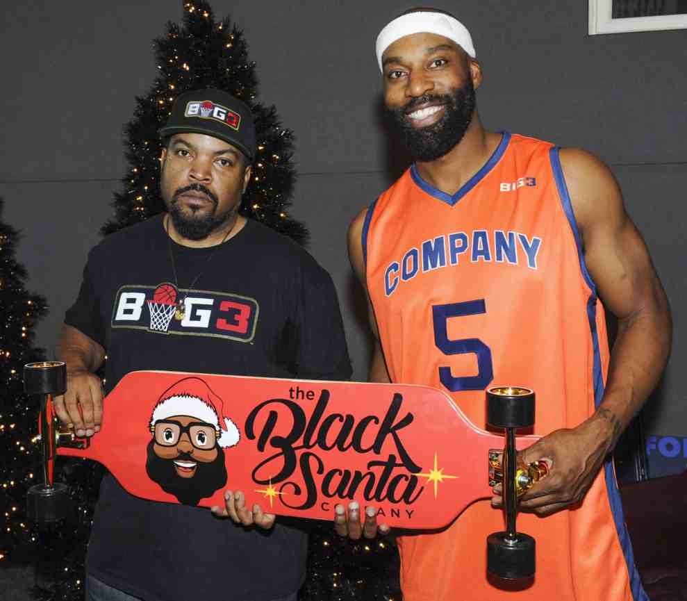 Ice Cube and Baron Davis pose for portrait at Baron Davis hosts Black Santa Celebrity Basketball Fundraiser