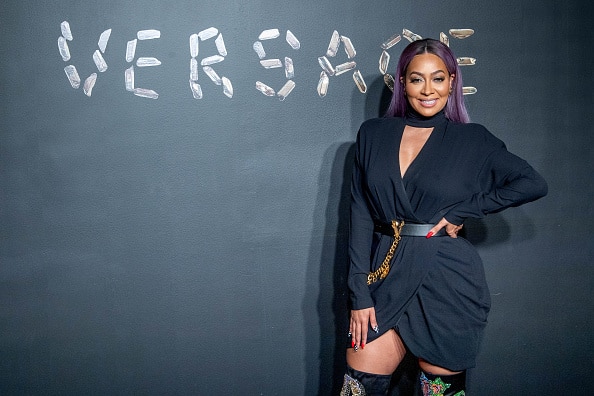 La La Anthony attends the the Versace fall 2019 fashion show at the American Stock Exchange Building in lower Manhattan on December 02