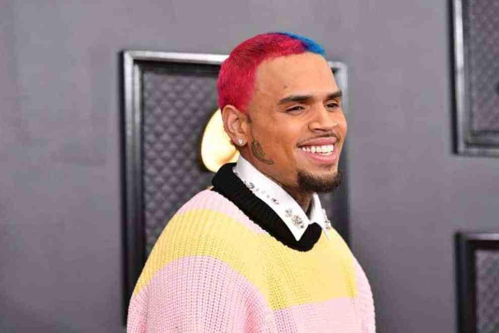 Chris Brown smiling at the camera