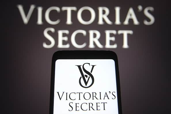 UKRAINE - 2021/04/16: In this photo illustration a Victoria's Secret logo of an US lingerie company is seen on a smartphone and a pc screen.