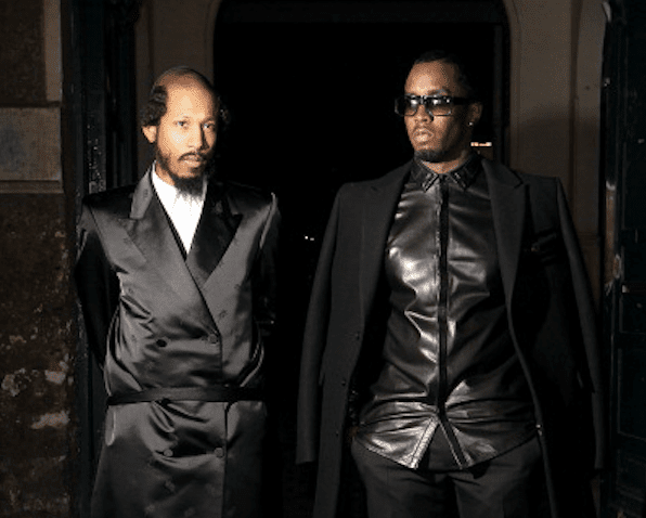 Shyne (Moshe Levi Ben-David) and Sean "Diddy" Combs (R) attend the Givenchy Ready-To-Wear Fall/Winter 2012 show as part of Paris Fashion Week on March 4