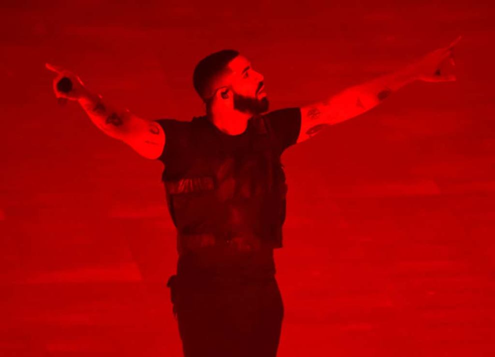 Drake Performs onstage with red lights