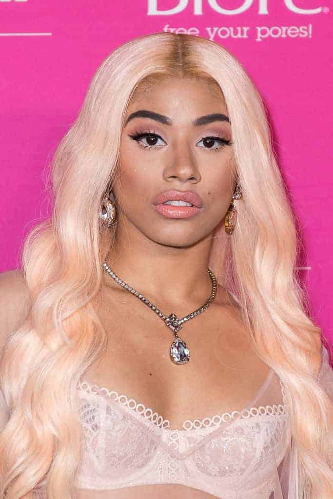 Hennessy Carolina in front of a pink back drop