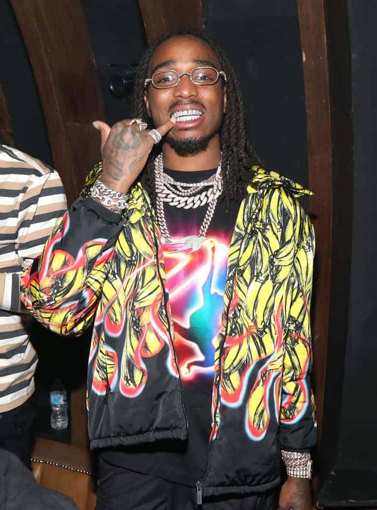 Quavo wearing multiple colors