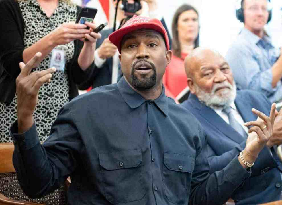 Kanye west wearing MAGA hat