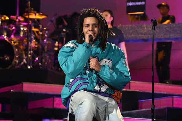 J. Cole performs at halftime during the 68th NBA All-Star Game at Spectrum Center on February 17