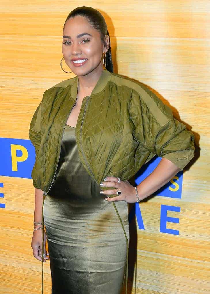 Ayesha Curry wearing green