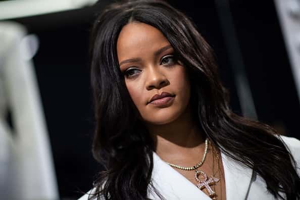 Barbados' singer Rihanna poses during a promotionnal event of her brand Fenty in Paris on May 22