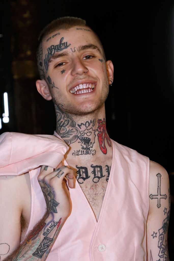 Lil Peep wearing all pink and smiling