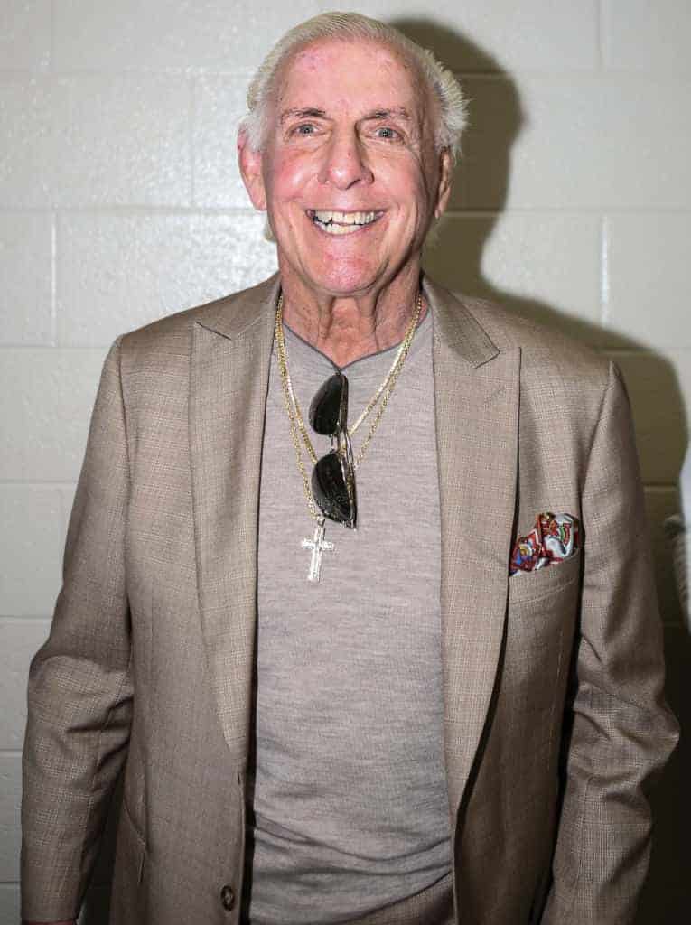 Ric Flair wearing a tan suit