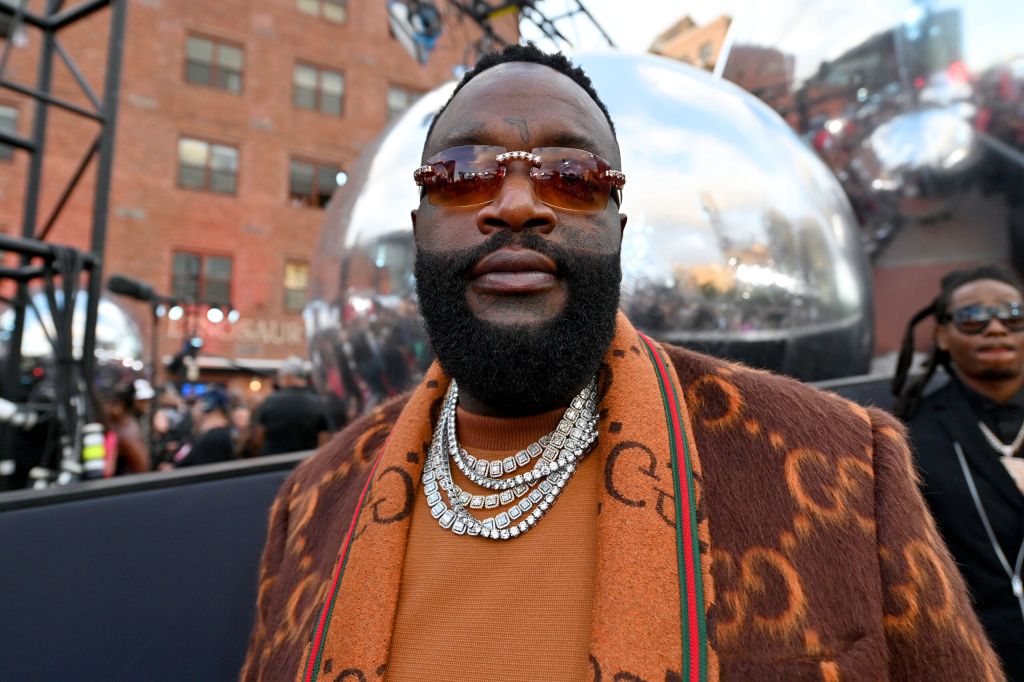 Rick Ross Struggles To Hang On While Being Towed On A Water Tube 