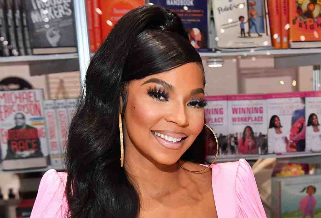 ‘Can Nelly Fight?’ Fans GUSH Over Ashanti’s Bikini & Thigh-High Boot Thirst Traps  