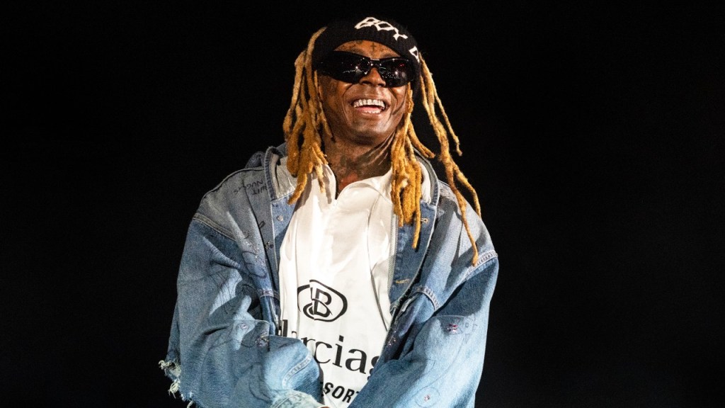 Lil Wayne Wins Bid for Travis Hunter at Young Money Sports