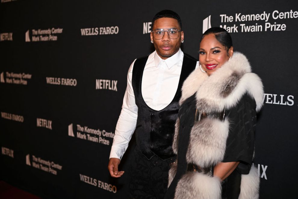 US rapper Nelly (L) and US singer-songwriter Ashanti arrive for the 25th Annual Mark Twain Prize For American Humor at the John F. Kennedy Center for the Performing Arts in Washington, DC, on March 24, 2024. This year's award, which is named to honor one of the world's greatest humorists, honors US actor and comedian Kevin Hart.