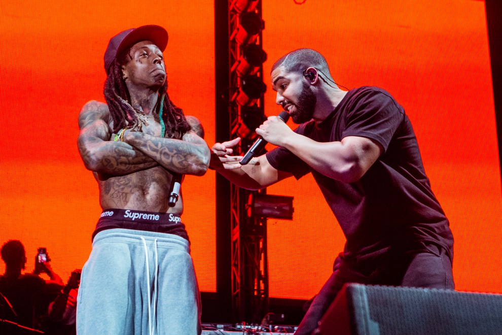 Lil Wayne (L) and Drake perform at Lil Weezyana Festival at Champions Square on August 28, 2015 in New Orleans, Louisiana.