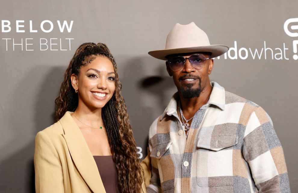 US actor Jamie Foxx (R) and his daughter US producer Corinne Foxx arrive for the Los Angeles premiere of "Below the Belt" at the Directors Guild of America in Los Angeles, October 1, 2022.