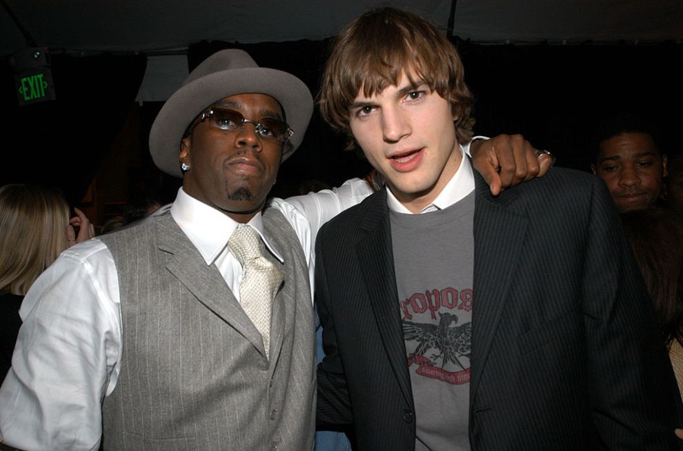 Sean "P. Diddy" Combs and Ashton Kutcher during VH1 Big In '03 - Backstage and Audience at Universal Amphitheater in Universal City, California, United States.