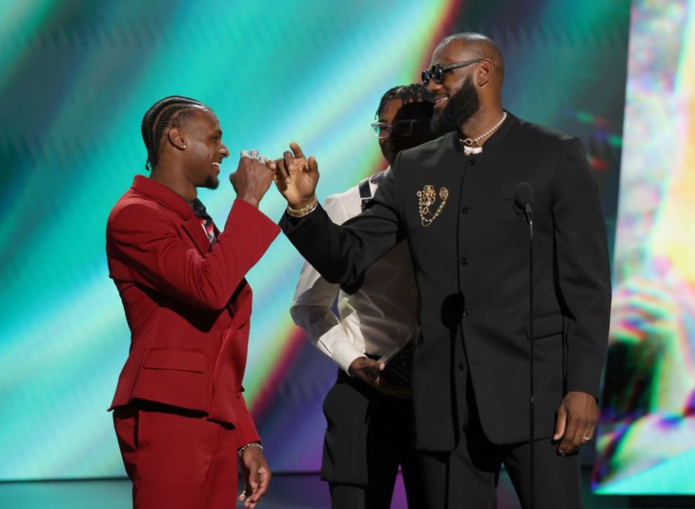 Bronny James and Bryce James present the LeBron James with the Best Record-Breaking Performance award onstage during The 2023 ESPY Awards at Dolby Theatre on July 12, 2023 in Hollywood, California.