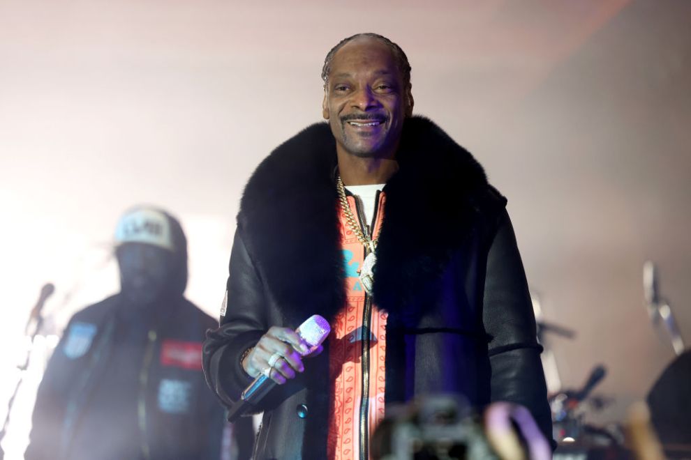 Snoop Dogg performs onstage during Flipper's Roller Boogie Palace big game after party celebrating the release of "Coming Home" by Usher and "Gin & Juice" by Dre and Snoop at Encore Beach Club at Wynn Las Vegas on February 11, 2024 in Las Vegas, Nevada.